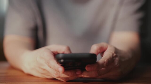 Smartphone user using app, typing chat with artificial intelligence assistant technology, searching information on social media network, closeup view of modern lifestyle.