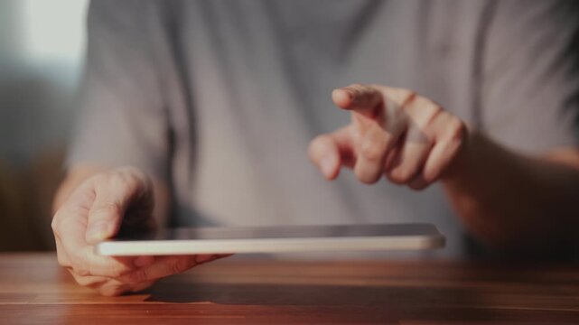 Title: Hand holding digital tablet, using touch with artificial intelligence assistant technology for modern interaction, searching online within a virtual workspace environment.