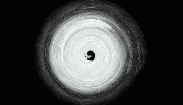 Black and white hypnotic spiral pattern with central dot in abstract monochrome design