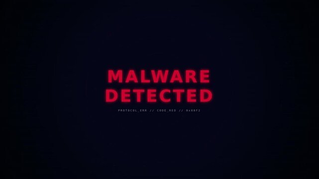 A digital alert warns users of malware detection, displayed in bold red text against a dark, ominous background