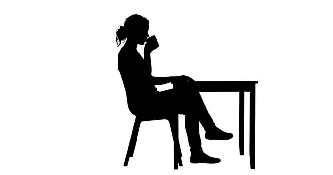 Black silhouette of a person sitting casually while drinking coffee
