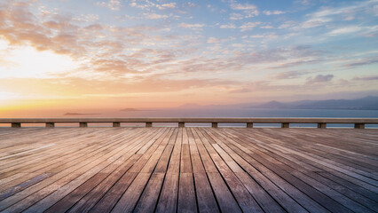 Fototapeta premium Wooden Pier View At Beautiful Sunset Over Calm Ocean
