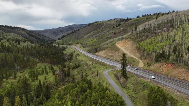 Aerial of US Highway 40 south of Heber City in Utah Uinta Mountains in spring