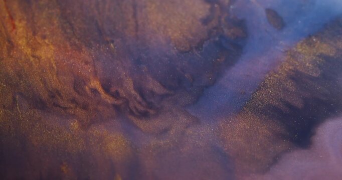 Flow spatter. Color stream. Defocused yellow blue neon bright paint liquid particles sparkling splash floating on abstract background.