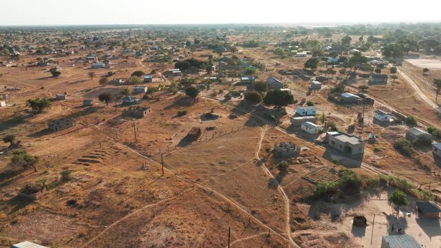 Drone flies over rural village