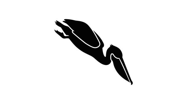 Silhouette of a pelican diving for fish.