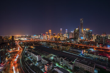 Fototapeta premium Panoramic night view of China Zun, Beijing CBD, showcasing the vibrant urban skyline of the bustling metropolis.