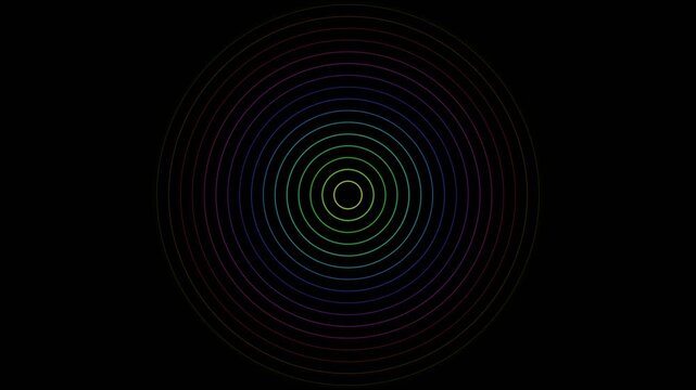 Concentric circles of vibrant rainbow colors set on a deep black background