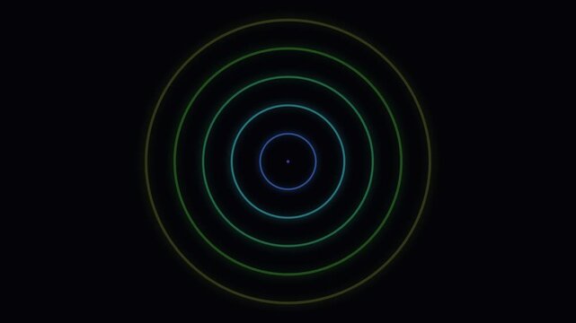 A glowing orange circular ring with a central point against dark background