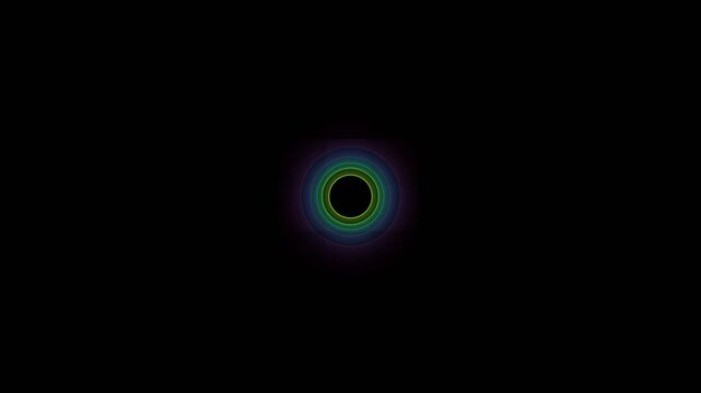 A glowing concentric circle pattern isolated on a deep black background