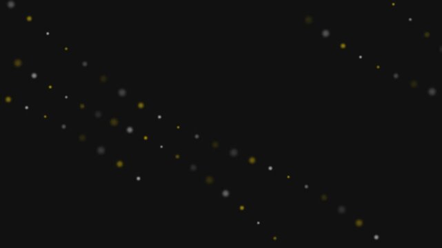 Abstract composition of golden and silver dots arranged in diagonal lines