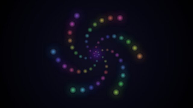 Vibrant colorful spiral dots forming an abstract radial pattern on black