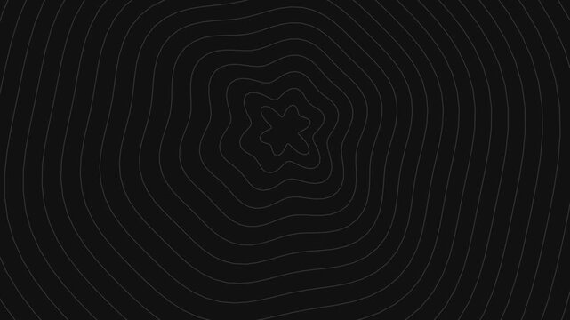 Concentric rings forming an abstract ripple pattern on a pitch black background
