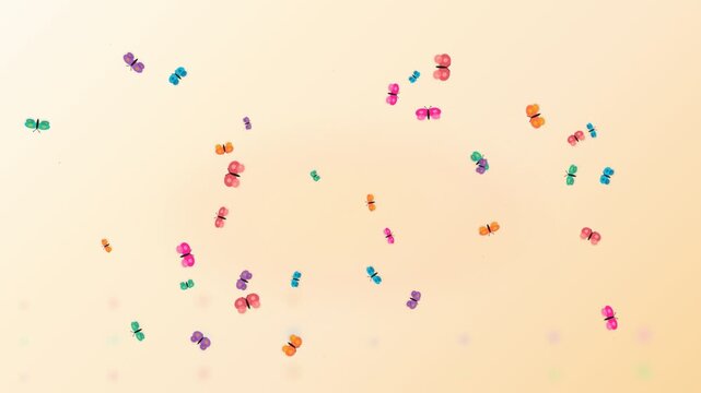 A vibrant collection of small colorful butterflies isolated on a yellow background