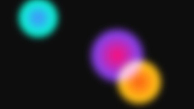 Three vibrant glowing light orbs floating against a deep black background