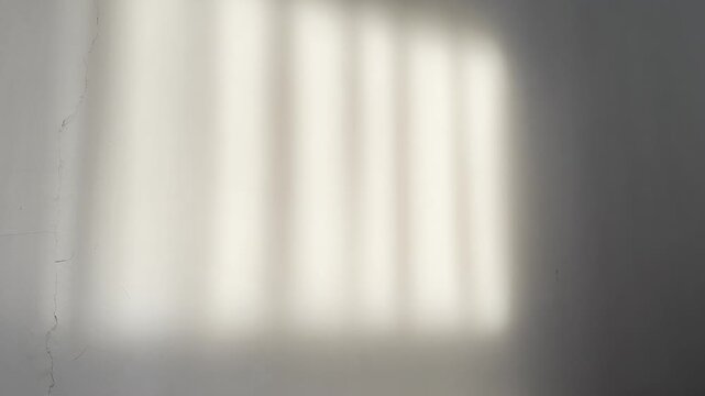 Minimal still footage of sunlight reflections on a cracked white wall. Ideal for cinematic overlays, editorial backgrounds, luxury branding, and ambient visuals.