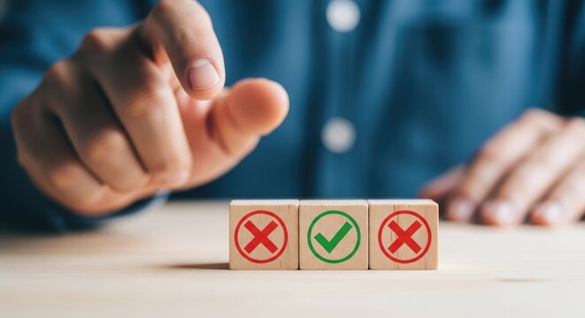 Right or wrong wooden blocks with a person choosing the correct option