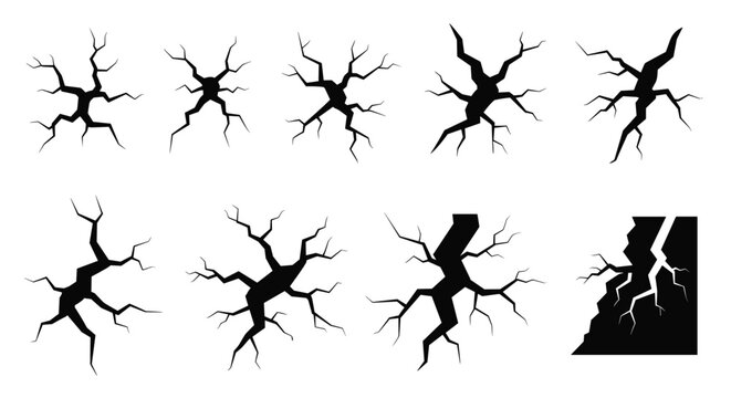 Selection of various black crack and fracture silhouettes on a clean white background for disaster and damage design concepts.