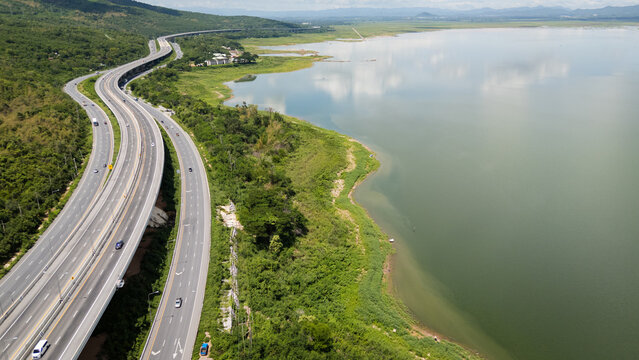 Drone shot The M6 motorway Nakhon Ratchasima Province - Bang Pa-in Lam Ta Khong River and Mountain. Motorway Korat Thailand