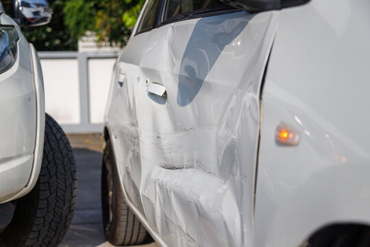 Car accident damage after collision on urban road
