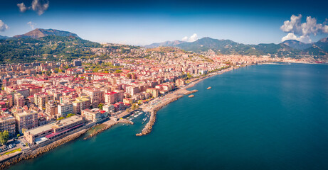 Obraz premium Bright morning view from flying drone of Salerno city, Italy, Europe. Aerial summer seascape of Mediterranean sea. Traveling concept background.