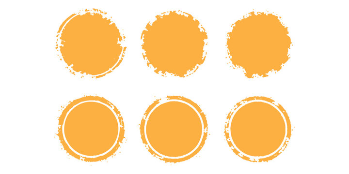 Set of six orange distressed circular badges and grunge textured round labels for design elements