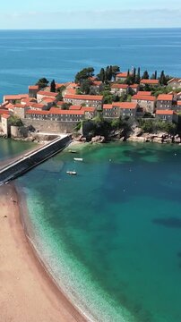 Scenic aerial view of sveti stefan, a small islet and 5-star hotel resort on the adriatic coast of montenegro, near budva