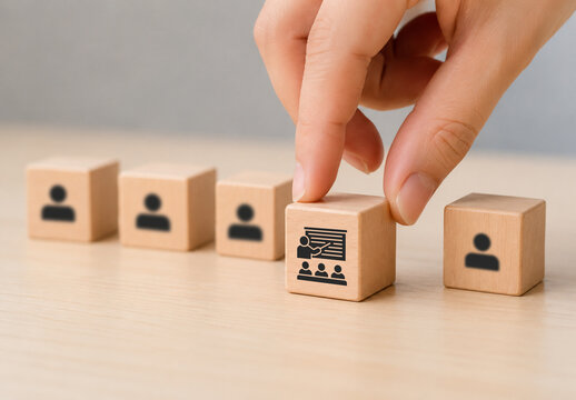 Training and Workforce Development. Wooden blocks with training and human icons, symbolizing structured learning, skill development and leadership driven training programs. Learning management system