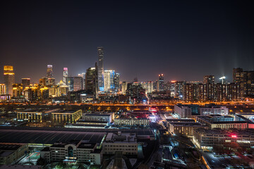 Fototapeta premium Aerial view of Beijing CBD from China: Winter night view of China Zun.