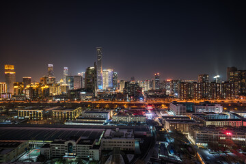Fototapeta premium Aerial view of Beijing CBD from China: Winter night view of China Zun.