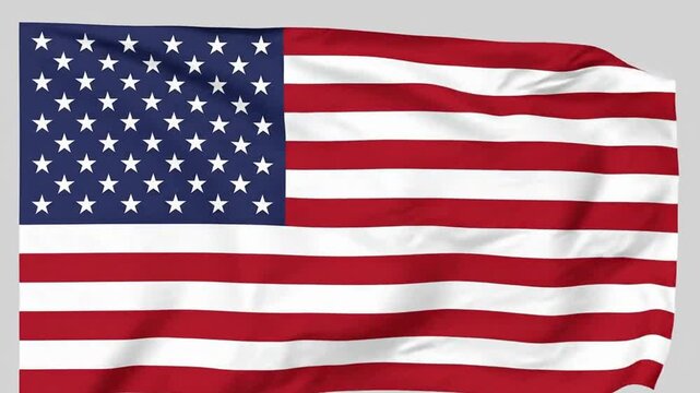 American flag waving with fifty white stars and thirteen red white stripes symbolizing freedom and patriotism