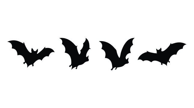 Four black bat silhouettes flying