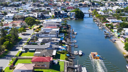 Aerial View of Luxury Waterfront Homes and Canal in Gold Coast Australia © blueringmedia