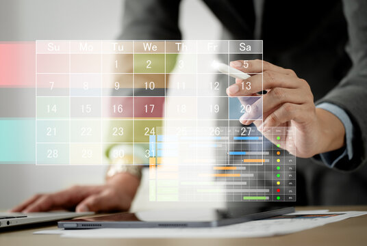 Businessman manages time for effective work. Businessman with calendar meeting schedule marking note target date appointing reminder appointment calendar for organizer agenda time. schedule activity.	