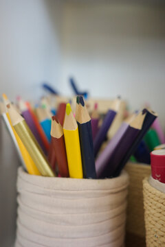 Colored Pencils In Holder In Classroom