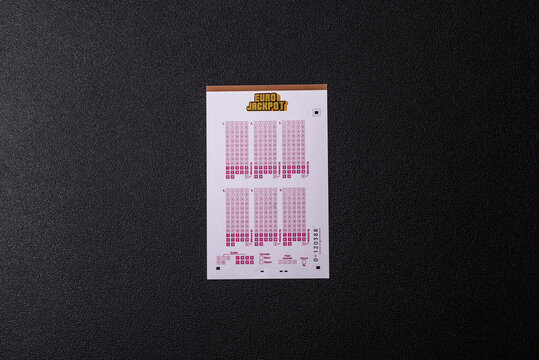 Ivano-Frankivsk, Ivano-Frankivsk region Ukraine - May 17 2026: EuroJackpot lottery ticket, euro banknotes and a pen