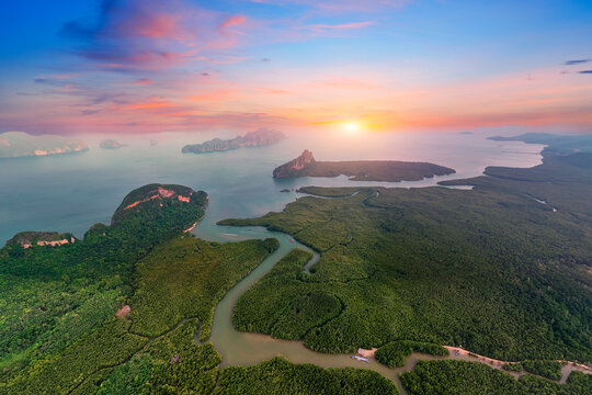 Amazing panoramic magical aerial view of the bay with scallops and river delta in the jungle early in the morning at sunrise