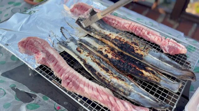 Delicious Korean style grilled freshwater eel and pork belly samgyupsal