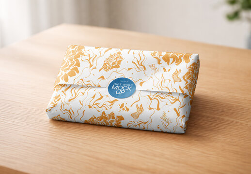 Gift Wrap Paper Mockup Perspective View With Round Sticker On Wooden Table