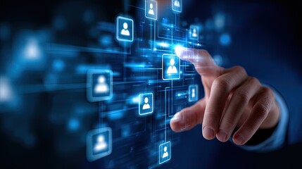 Fototapeta premium Finger touches glowing user icons in digital network, symbolizing connection