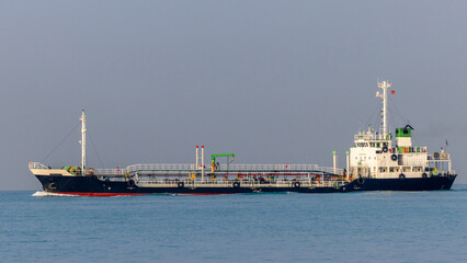 Fototapeta premium Oil and gas tanker ship freight shipping oil and gas, Global business freight shipping import export logistic transportation oil and gas product tanker ship, Sea freight oil product ship tanker.