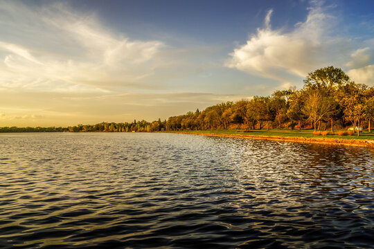 Loring Park Lake in Minneapolis, Minnesota, during the golden hour.
