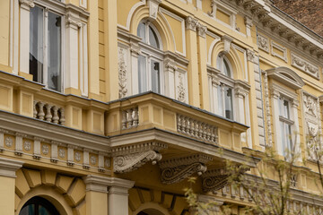 Historic Yellow Facade Ornate Balcony Details © Mikhail