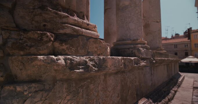 Stone columns and base detail on the Temple of Augustus.