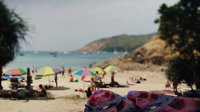 Miniature tilt-shift effect on crowded tropical beach