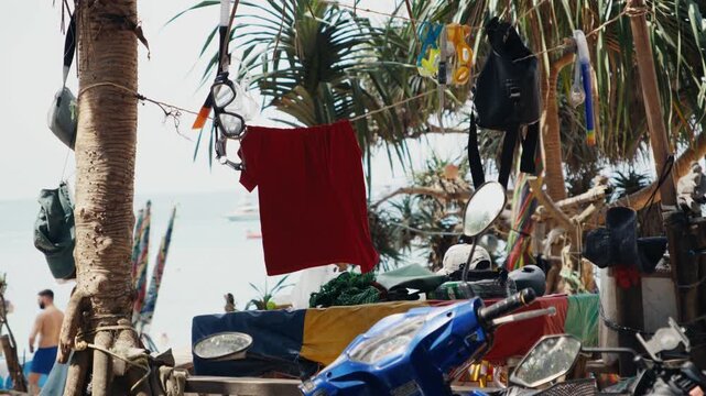 Laundry drying on clothesline at tropical beach camp