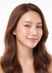 Fototapeta premium Beautiful Asian female model in natural candid pose, healthy glowing skin with subtle blush
