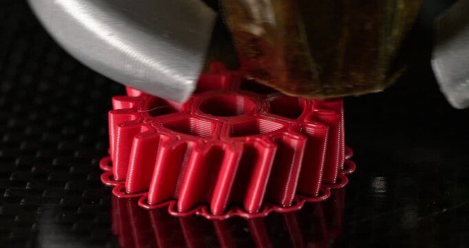Gear 3D printing process. Printing on a сartesian kinematics printer. Close-up footage 4k.