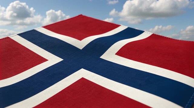 Waving red national flag shifting from close-up to pale sky with cumulus, prompted by light breeze