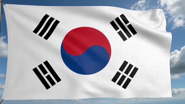 Waving South Korean flag revealing Taegeuk circle and four trigrams at pole in steady breeze